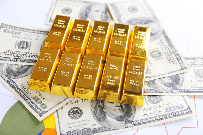Dólares y subida del oro