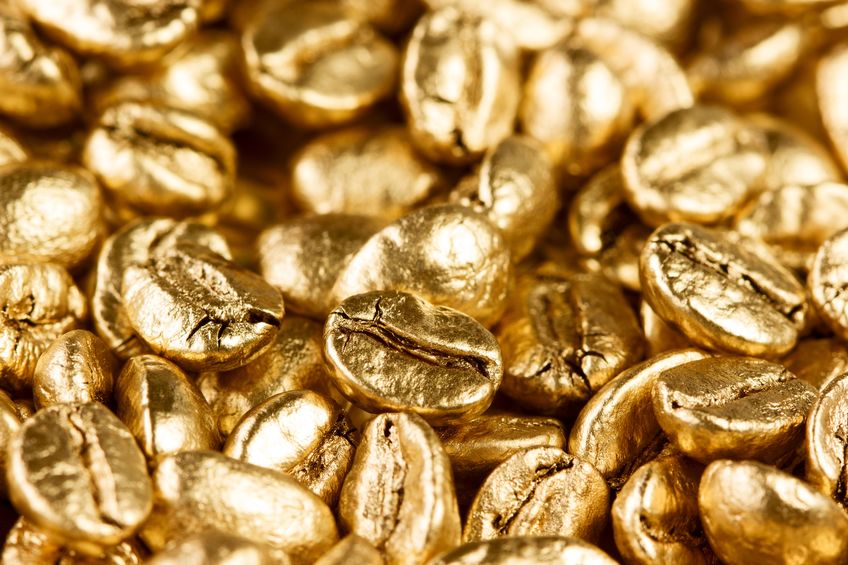 Granos de café de oro