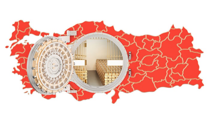 Cámara acorazada con lingotes de oro sobre el mapa de Turquía