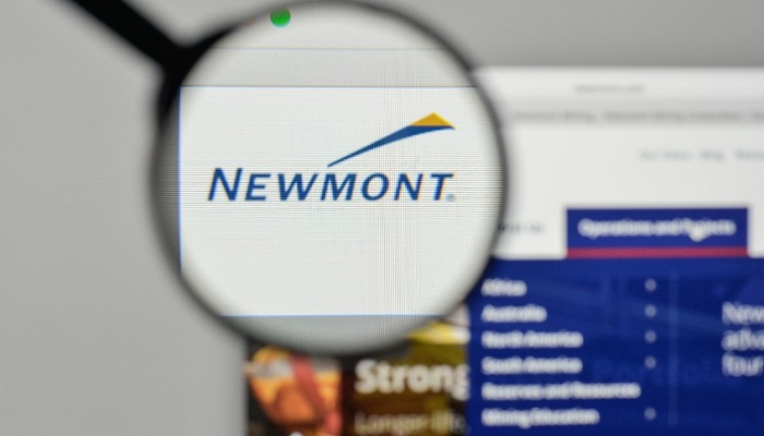 Lupa y logo de Newmont